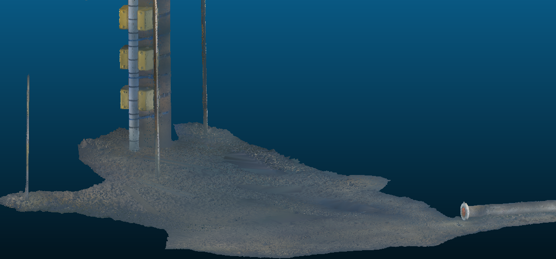 Actual 3D reconstruction showing the seabed between a pipeline end and a pile with three visible clamps